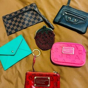 Lot of 6 assorted wallets including Marc Jacobs Pink Quilted Pouch and Red Pouch